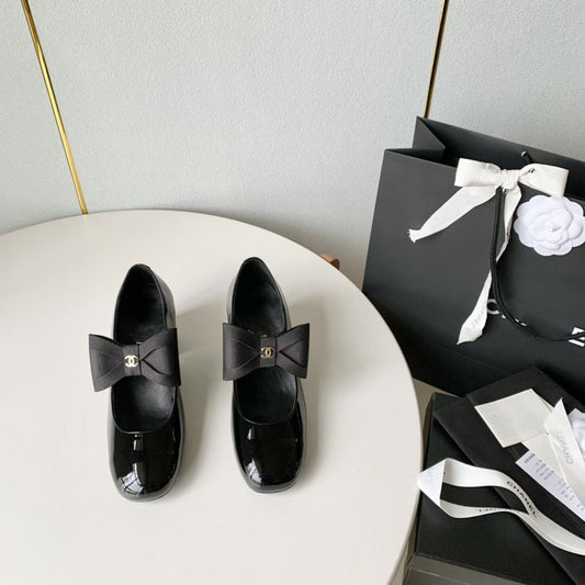 mary janes 60 black patent calfskin bow
